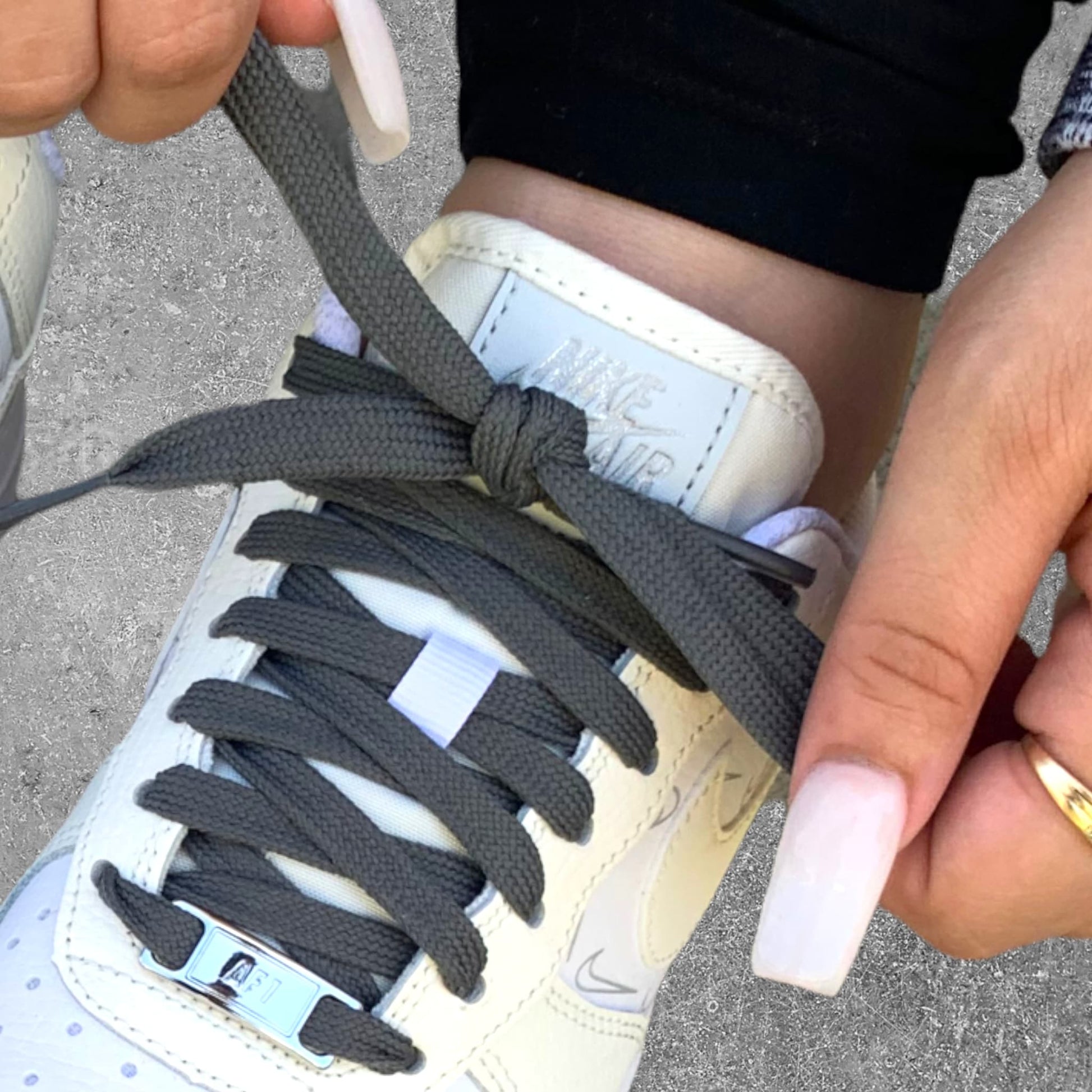GAME Grey Shoelaces in sneakers being tied 